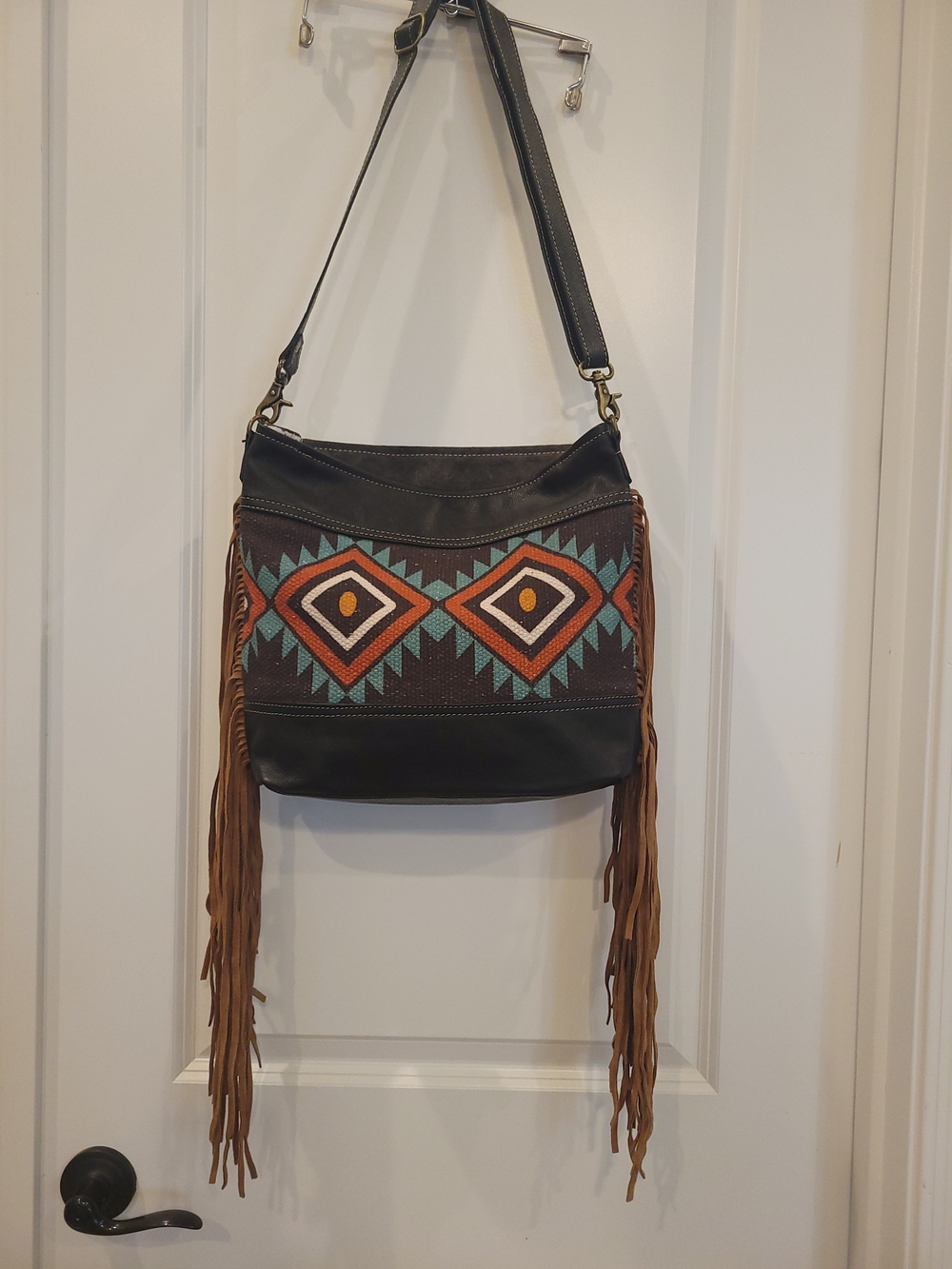 Suede Fringe Hobo Bag with Woven Aztec Design and Leather Straps and accents